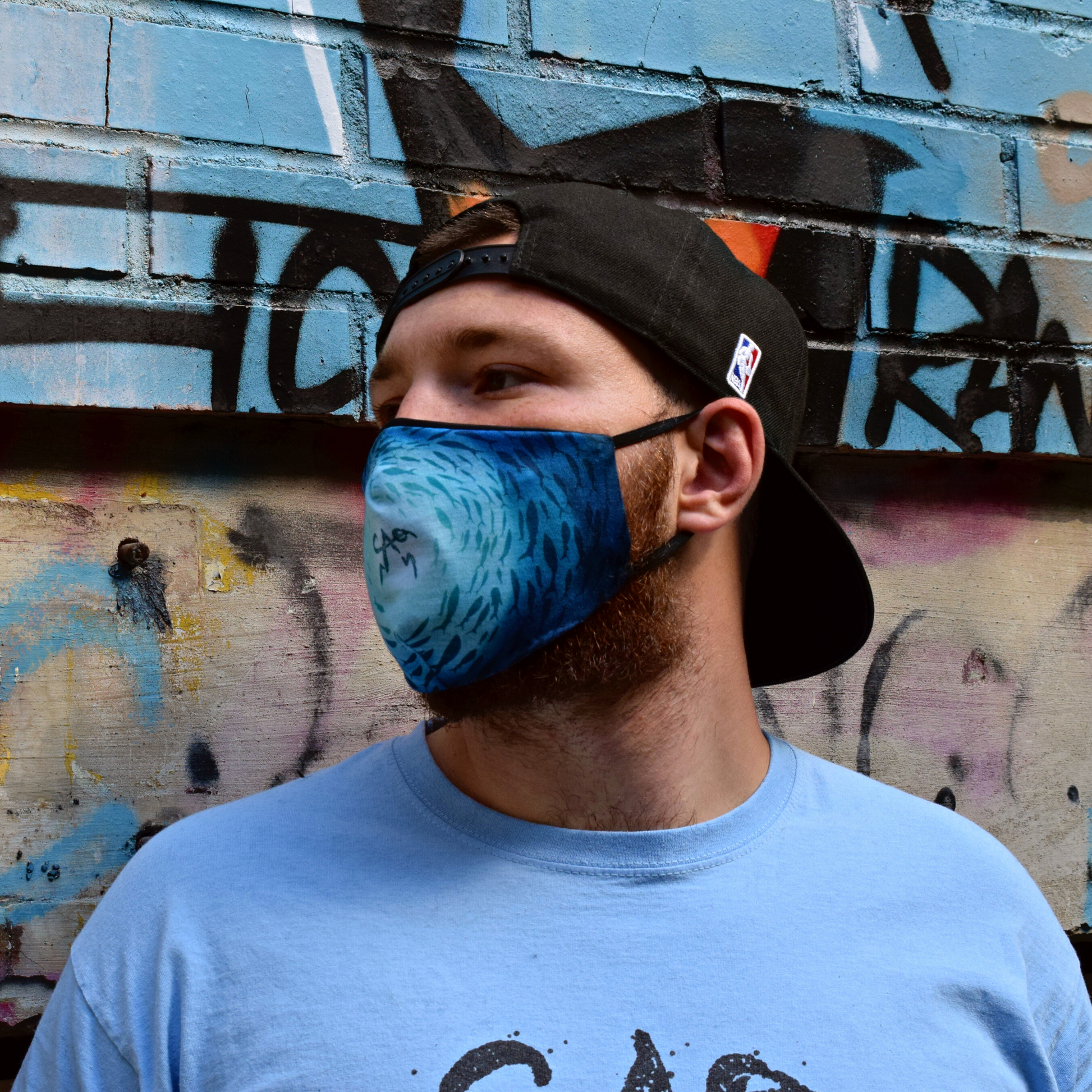 logo mask blue model outdoor